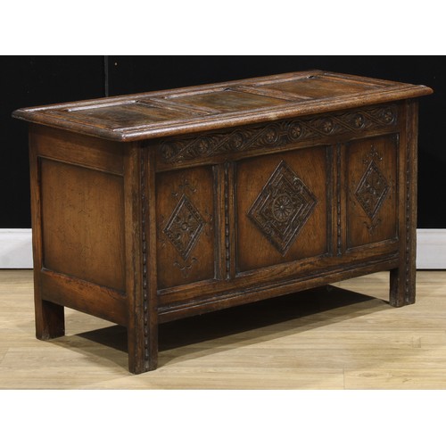 212 - A 17th century style oak blanket chest, 61cm high, 107cm wide, 48cm deep