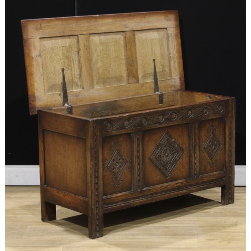 212 - A 17th century style oak blanket chest, 61cm high, 107cm wide, 48cm deep