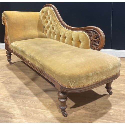 213 - A Victorian walnut and mahogany chaise longue, deep-button back, stuffed-over upholstery, 90.5cm hig... 