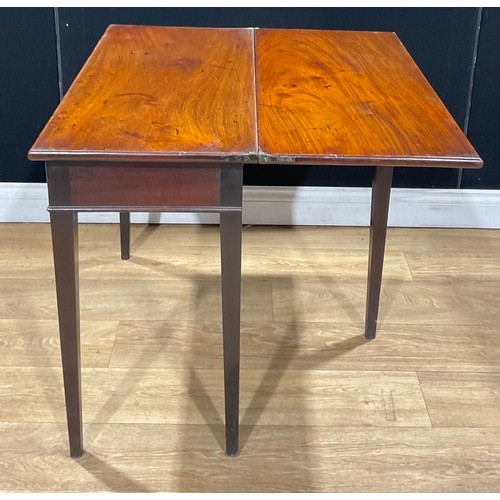 312 - A George III mahogany tea table, of slightly smaller proportions, hinged top, tapered square legs, 7... 