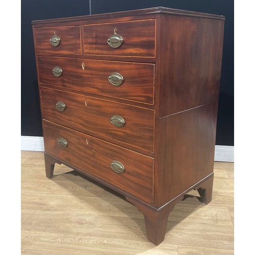 313 - A Post-Regency mahogany chest, of two short and three long graduated drawers, 99.5cm high, 96.5cm wi... 