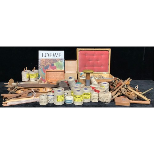 585 - A collection of wooden weaving tools including shuttles, beaters, forks, bobbins, bodkins, spindle, ... 