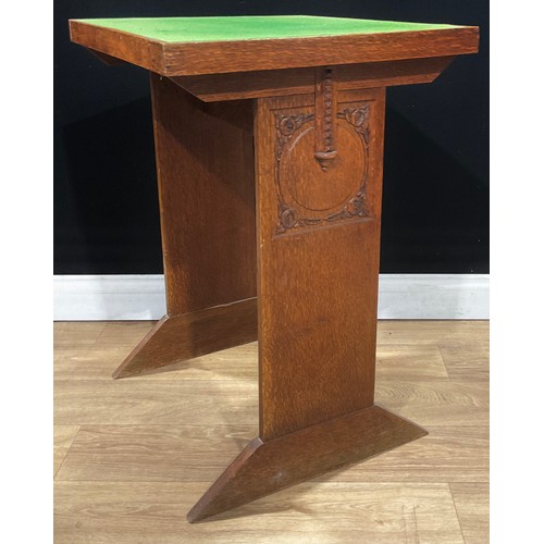 407 - An Arts & Crafts period oak games table, 79.5cm high, 60.5cm wide, 53cm deep