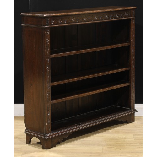 412 - An oak open bookcase, 108.5cm high, 120.5cm wide, 28cm deep