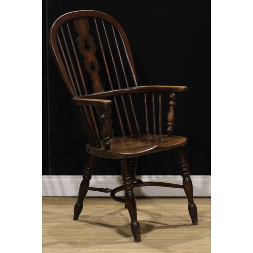 415 - A Yorkshire beech, ash and elm Windsor elbow chair, 107cm high, 53cm wide, the seat 39cm wide and 33... 