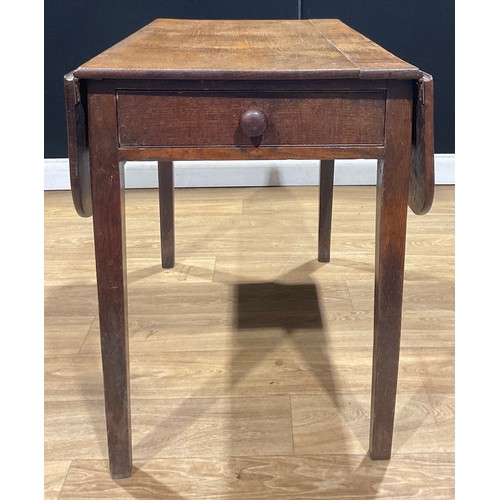 521 - A George III oak Pembroke table, rounded rectangular top with fall leaves above a single frieze draw... 