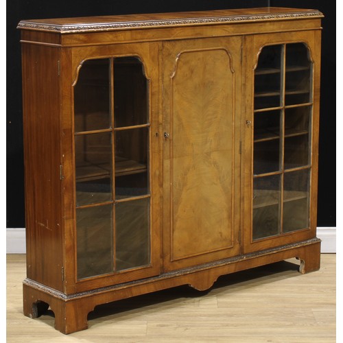 536 - A George II inspired walnut bookcase, 115cm high, 134cm wide, 30.5cm deep