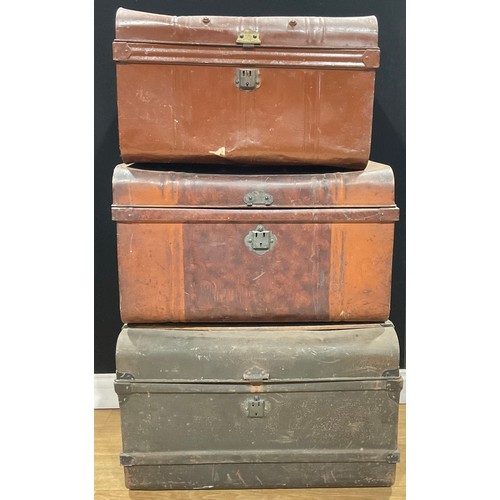 646 - A large tin steamer trunk, 72cm wide; others similar (3)