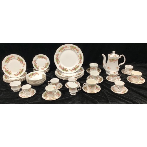 674 - A Queens Rosina China Co. Woman and Home pattern dinner and coffee service, transfer printed with ho... 