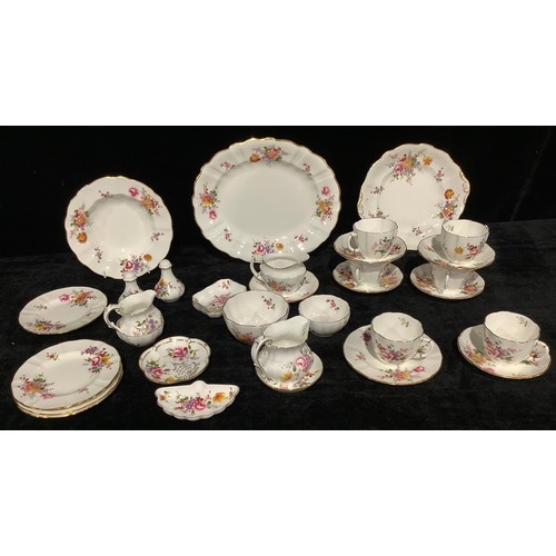 685 - A Royal Crown Derby Posies pattern tea set for six, three milk jugs and sugar bowls, salt and pepper... 