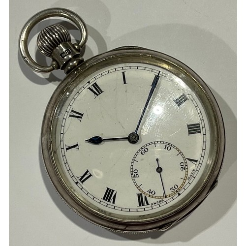 746 - A silver open faced pocket watch, top winding, Birmingham 1928