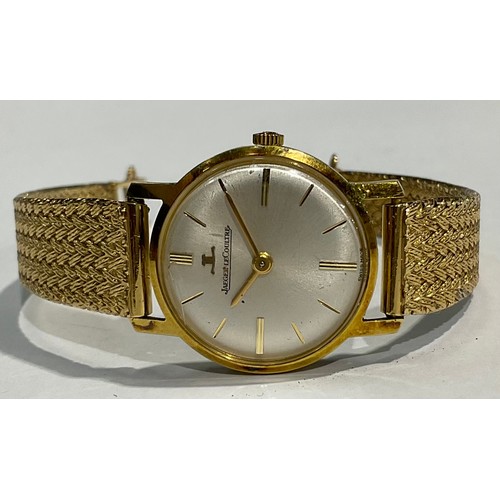 753 - A lady's Jaeger Le Coultre gold plated watch, Champagne dial, baton indicators, marked 