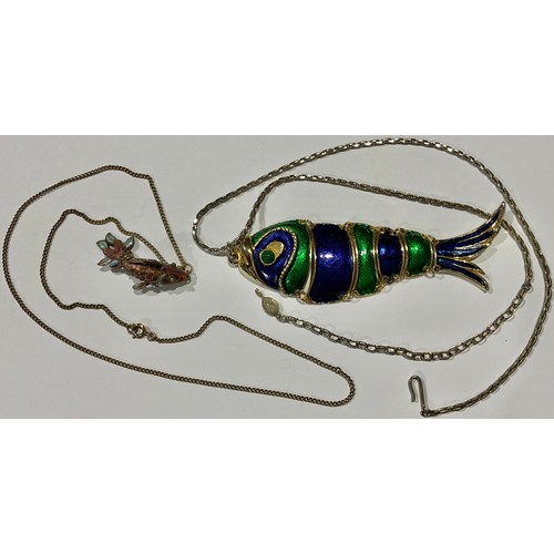 763 - A silver and enamel reticulated fish pendant, 4cm, suspended from a base metal necklace chain; a lar... 