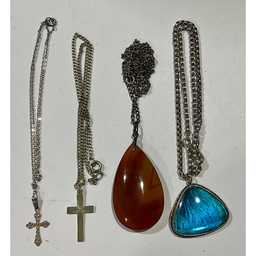 771 - An agate pendant, on silver chain; other silver necklaces (4)