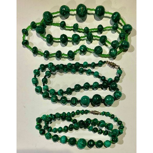 772 - A string of malachite beads; others (3)