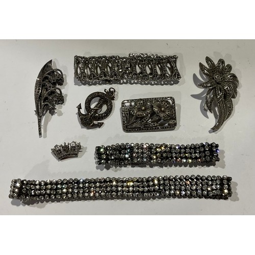 776 - A collection of marcasite silver mounted and paste jewellery, brooches, bracelet, etc