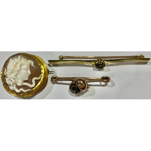 793 - An Edwardian gold coloured metal bar brooch, probably 14ct, set with aquamarine, 4.1g; a 9ct gold sh... 