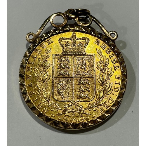 803 - A Victorian full gold sovereign, 1873, young head, shield back, mounted in 9ct gold as a pendant, 9g