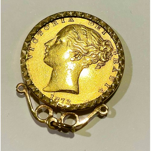 803 - A Victorian full gold sovereign, 1873, young head, shield back, mounted in 9ct gold as a pendant, 9g