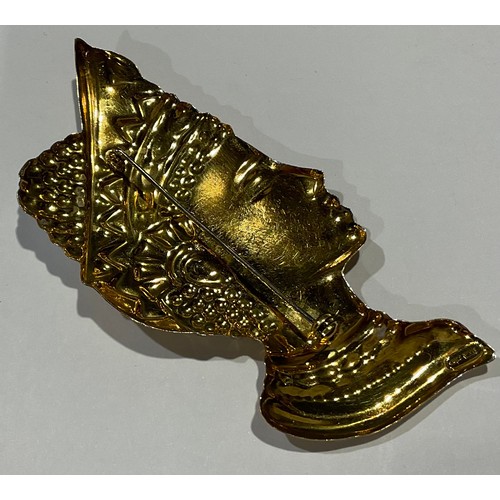 810 - A large gold coloured metal brooch embossed as a female bust after the antique with Etruscan style h... 