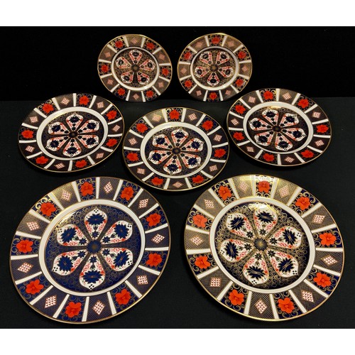 3 - Royal Crown Derby - a pair of Old Imari, 1128 pattern, cabinet plates, 27cm diameter;  and a further... 