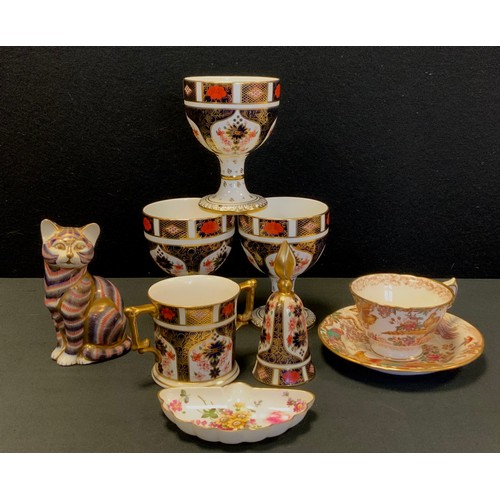 11 - Royal Crown Derby - 1128 pattern, including; three goblets, twin handled loving cup, table bell, cat... 