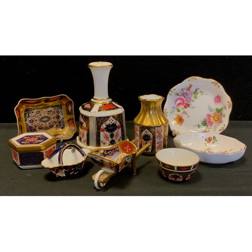 14 - Royal Crown Derby 1128 miniature wheel barrow, trinket trays, basket; hand bell, box and cover etc o... 