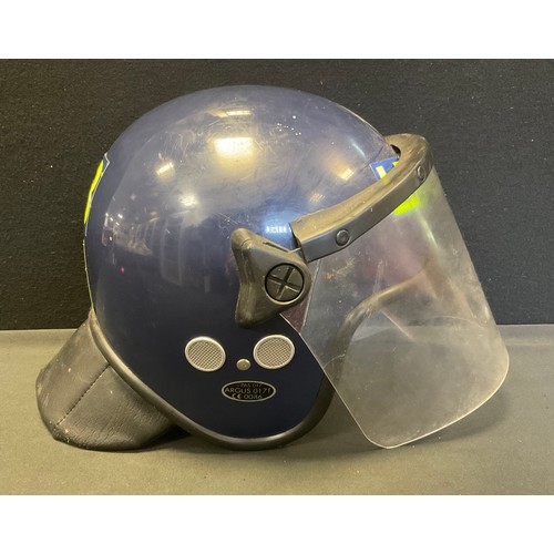43 - A Vintage Police Issue Riot Helmet, PAS 017, ARGUS 017T, 1CE 0086, blue, yellow issue numbers LBC 13... 