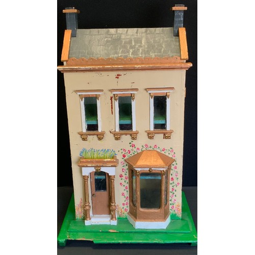 46 - A 20th century two story dolls house with fitted interior including furniture and appliances. 38cm h... 