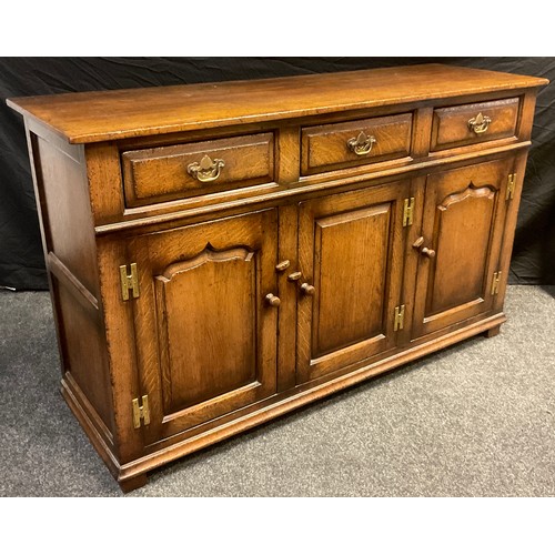 52 - A Titchmarsh and Goodwin sideboard or dresser base, model number RL19855, having three short drawers... 
