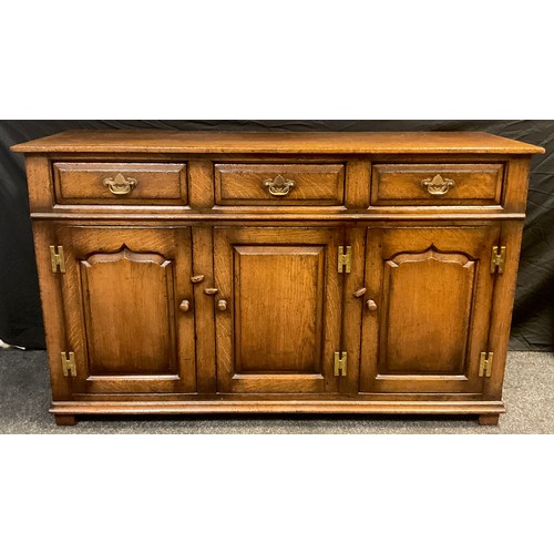 52 - A Titchmarsh and Goodwin sideboard or dresser base, model number RL19855, having three short drawers... 