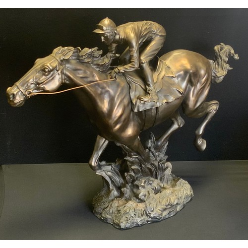 57 - A Fairestware Academy bronzed resin sculpture of a Racehorse and Jockey Galloping, impressed marks, ... 
