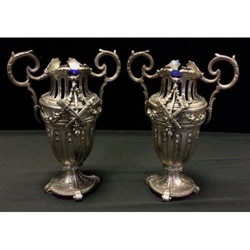 76 - A pair of late 19th century French silver plated twin-handled vases, pierced and cast in relief,28cm... 