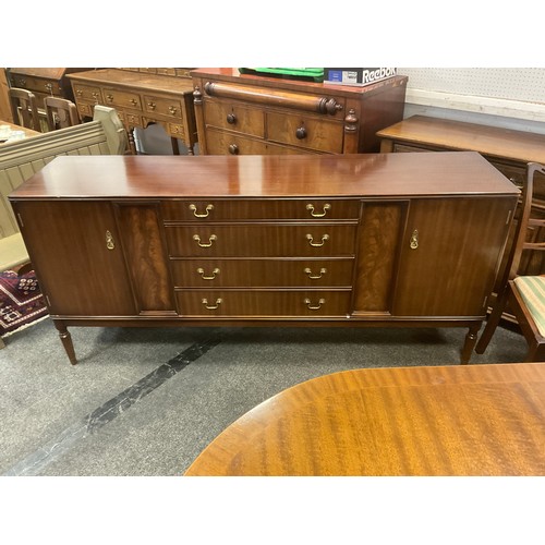 89 - A mahogany veneered dining room suite, by Strongbow furniture, comprising d-end dining table, six ch... 