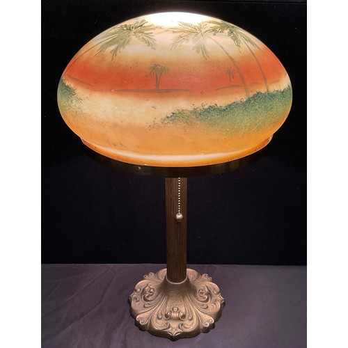 101 - A mid century, Pittsburgh Lamp Co. Style table lamp, the domed glass shade hand-painted with Palm tr... 