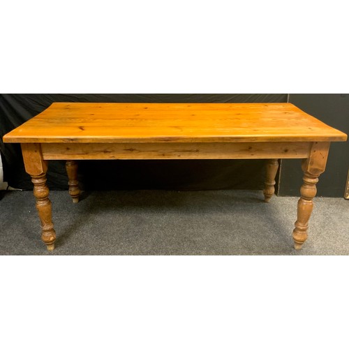 109 - A pine plank-top table, rounded rectangular top, turned legs, 78cm high x 173cm wide x 77cm, early 2... 