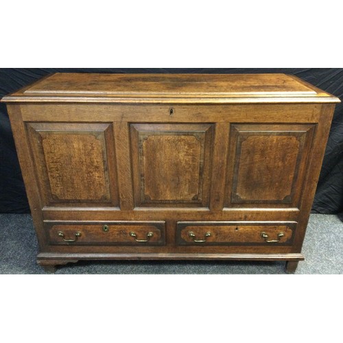 117 - A 19th century oak Lancashire mule chest, walnut cross-banded top, three-panel front, above pair of ... 