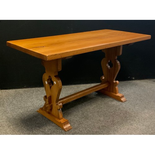 122 - A elm trestle table, 71cm high x 128cm wide x 60cm, 20th century.