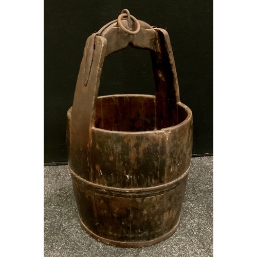 155 - An Asian rice pail or feeder bucket, iron foot sand fittings, ring top loop, approx 60cm high