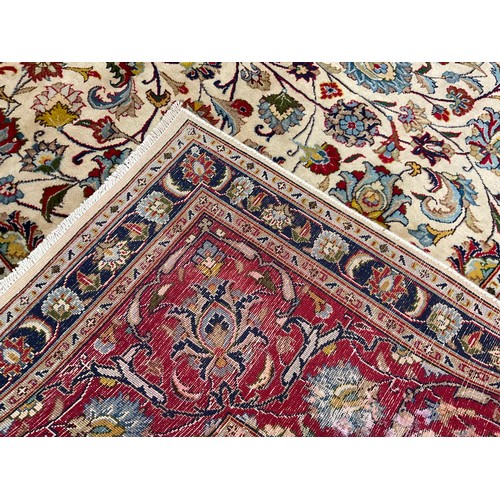 191 - A large Persian Hamadan rug / carpet, knotted with central lotus-shape medallion, within a field of ... 