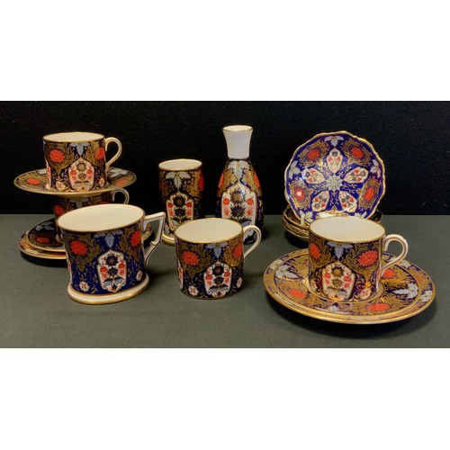 196 - Lynton Hamilton coffee set for three including three coffee cups and saucers, trinket tray, bud vase... 