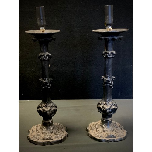 493 - Lighting - a pair of baroque style cast iron lamps, painted black, 48cm (2)