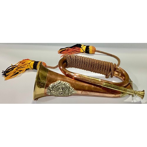 26 - Militaria - a copper and brass military bugle, applied with the insignia of the Argyll and Sutherlan... 