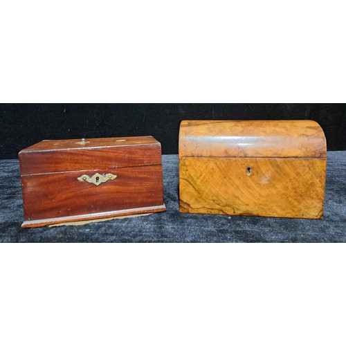 31 - A 19th century walnut rectangular dome topped tea caddy, the hinged cover enclosing two lidded compa... 