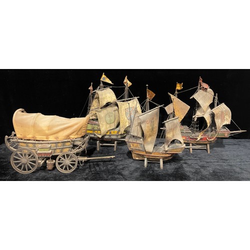 33 - A scratch built painted wooden model of a Man O' War ship, hide sails, stand, 47cm overall; others s... 