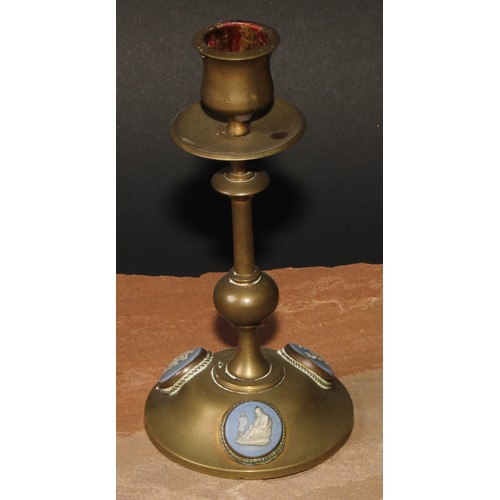 57 - A pair of 19th century jasperware mounted brass candlesticks, the cabochons sprigged in the Grand To... 