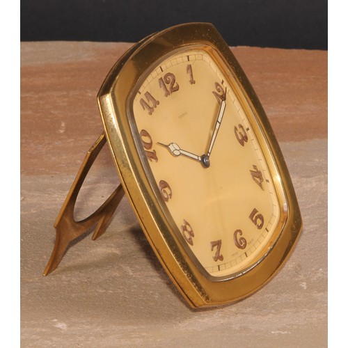 130 - An Art Deco gilt brass easel strut timepiece, 8.5cm clock dial inscribed with luminous Arabic numera... 