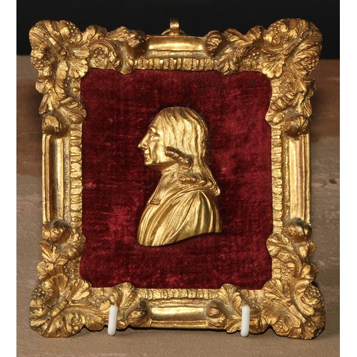 157 - Methodism - a pair of 19th century gilt metal portrait plaques, the rectangular plaques cast with fr... 