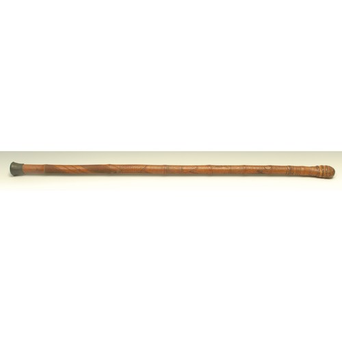 A Japanese bamboo novelty angler's walking stick, the shaft enclosing a telescopic  fishing rod, carv