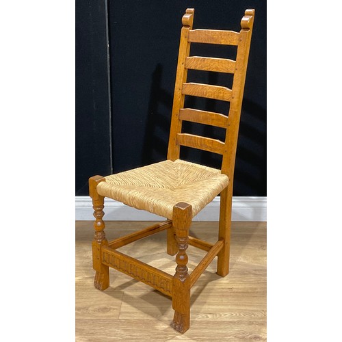 101 - A set of eight oak ladderback dining chairs, probably Rupert/Nigel Griffiths Monastic Woodcraft, 105... 